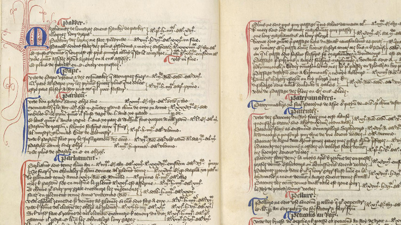 Manuscript page opening with black handwritten Latin script highlighted with blue and red