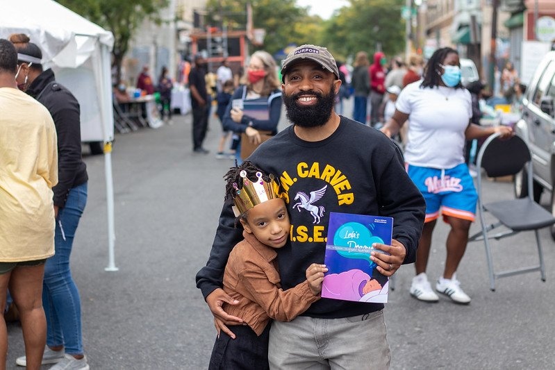 A father and daughter attend Philly's Reading Promise Week together.