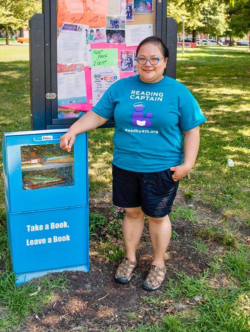 Erme C. Maula, Read by 4th Reading Captain, and the recycled newspaper-bin-turned-sidewalk-library installed in her neighborhood park.