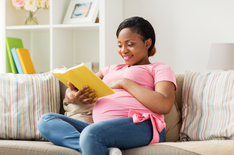Activities like singing, playing music, and reading stories aloud can foster your baby’s brain development in the womb.