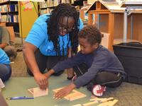 ASCE Engineer Guiding a Keeva Plank Engineering Activity