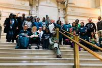 Free Library Staff showing their Eagles Green at Parkway Central Library