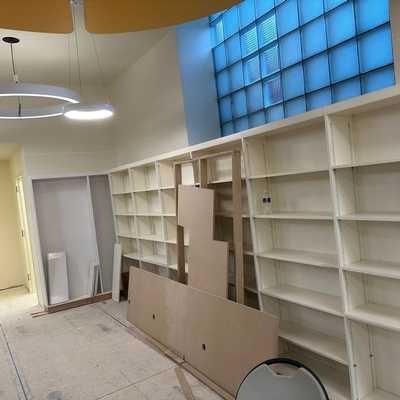 Library bookshelves being built