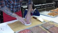 Bryan sharing his method of cooking burgers, along with his six-year-old daughter, Yvette