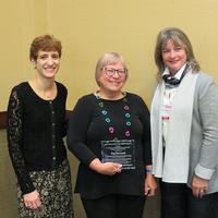 Peg Szczurek accepting award from Denise Agosto of Drexel University and Siobhan Reardon, President and Director of the Free Library of Philadelphia