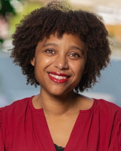 headshot of woman smiling